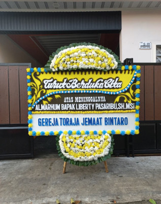 Papan Bunga Duka di Selomartani